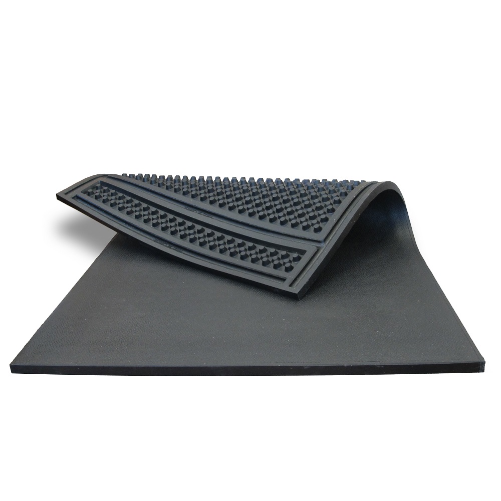 A black rubber mat with a rubber pad on top  Description automatically generated
